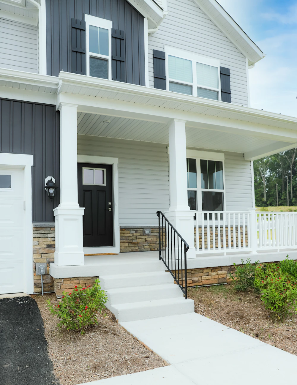 Newly built two-storey home with a covered front porch